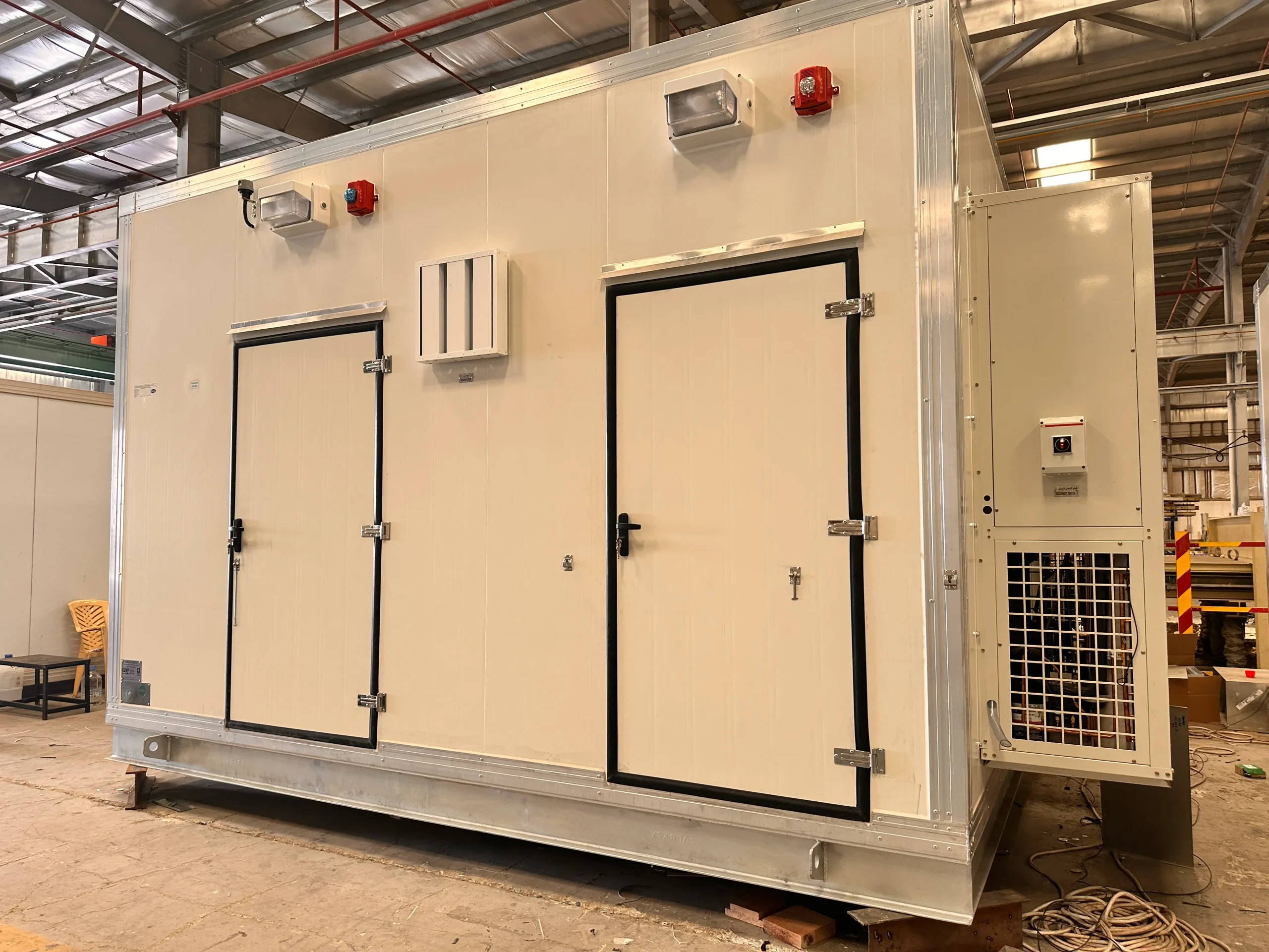 Secure access double doors and exterior alarm automation on Kenz equipment shelter